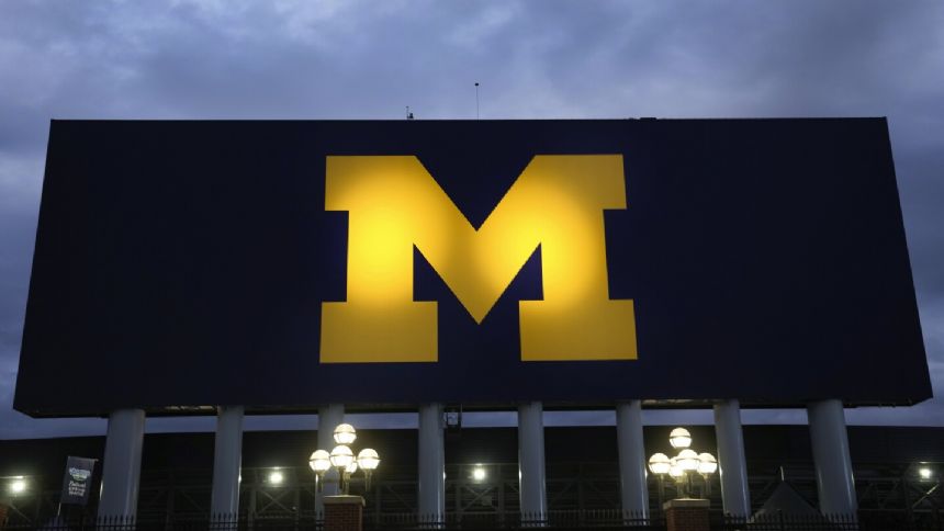Michigan awaits a judge's ruling on whether Jim Harbaugh can coach the team against Penn State
