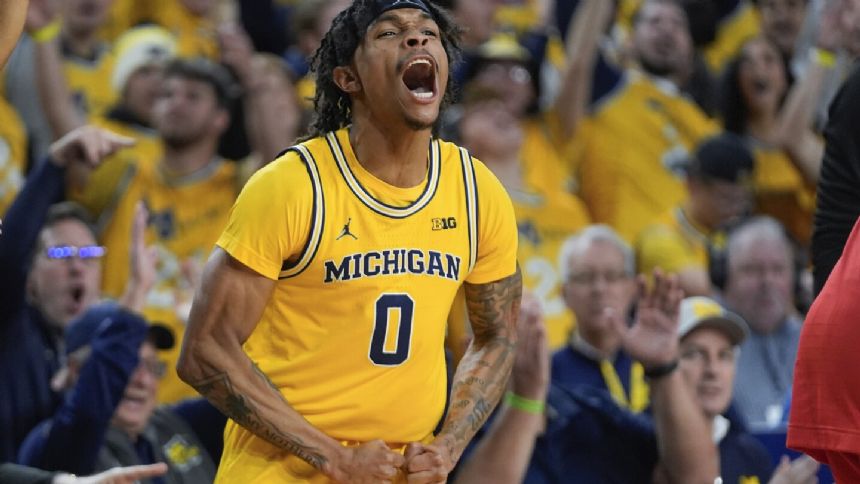 Michigan snaps 5-game losing streak, beats Ohio State 73-65 in front of the Fab Five