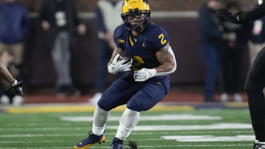 Michigan star Corum says he had no business with Stalions, unaware of online records in his name