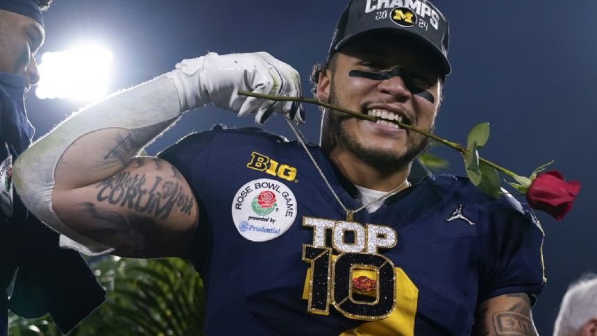 Michigan's Corum looks to cap record-breaking career with win over Washington in CFP title game