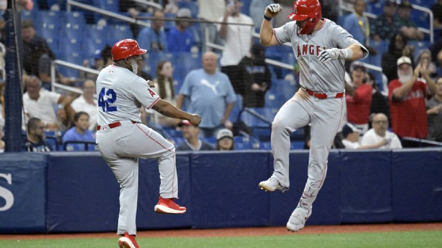 Mike Trout's 2-run homer highlights 5-run outburst in the 8th as the Angels top Rays 7-3