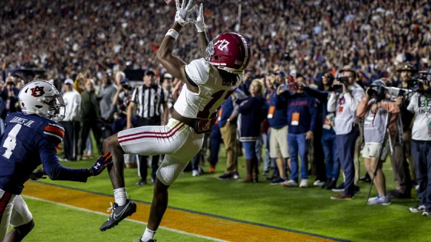 Milroe's TD pass to Bond on fourth-and-31 rescues No. 8 Alabama in 27-24 win over Auburn