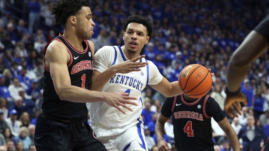 Mitchell scores 23, Reeves adds 21 as No. 8 Kentucky uses hot shooting to beat Georgia 105-96