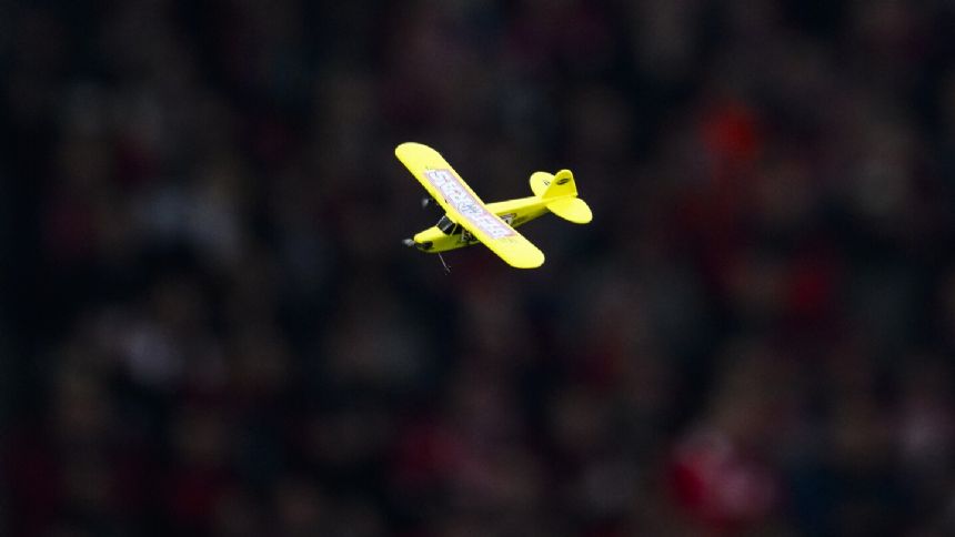 Model airplanes keep protests flying high in Bundesliga. Bayern game interrupted