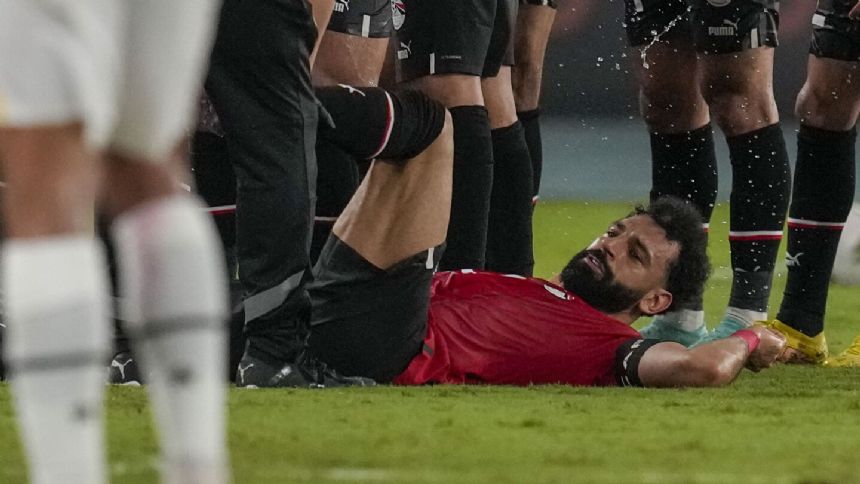 Mohamed Salah goes off injured during Egypt's game against Ghana at Africa Cup
