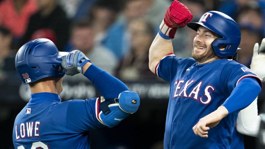 Montgomery sharp, Rangers hit 3 HRs to win fifth straight, beat slumping Blue Jays 10-0