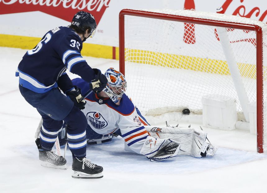 Morrissey has 2 goals, assist as Jets outlast Oilers 7-5