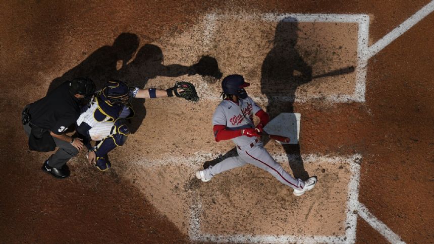 Nationals beat NL Central-leading Brewers 2-1 in 11 innings to avoid sweep