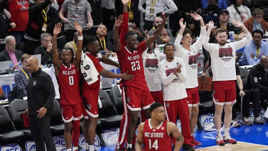 N.C. State pulls away early in 2nd half, beats Syracuse 83-65 in ACC Tournament second round