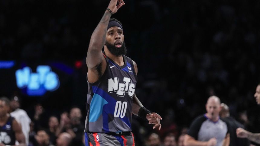 Nets pull away in fourth quarter for a 124-104 victory over Magic in the In-Season Tournament