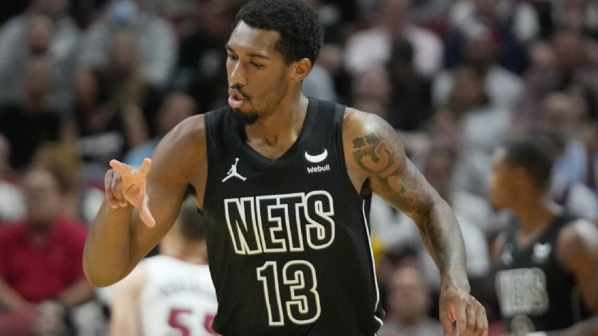 Nets rally in 2nd half, top Heat 109-105 to add to Miami's miserable 1-4 start