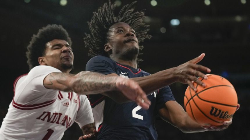 Newton helps No. 5 UConn pull away from Indiana in 77-57 victory in Empire Classic