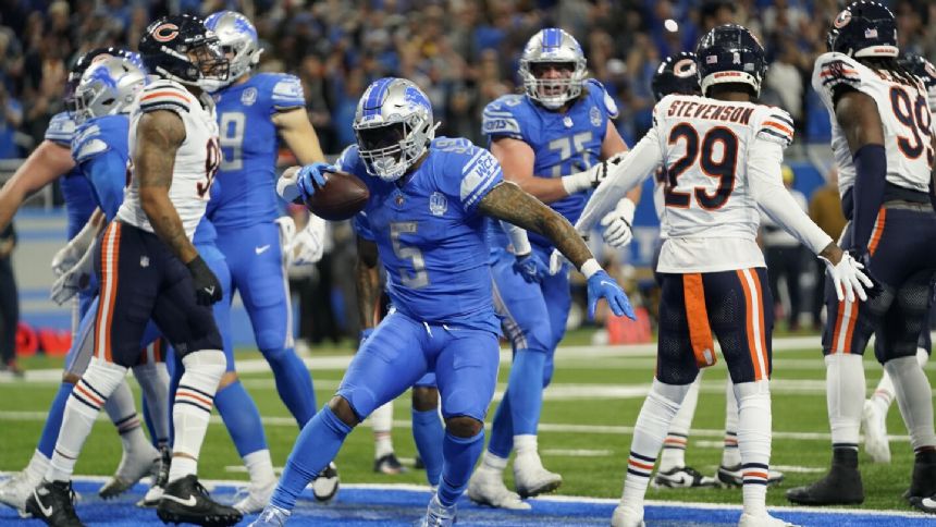 NFC North-leading Lions rally from 12-point deficit late to beat Bears 31-26 on Montgomery's TD run
