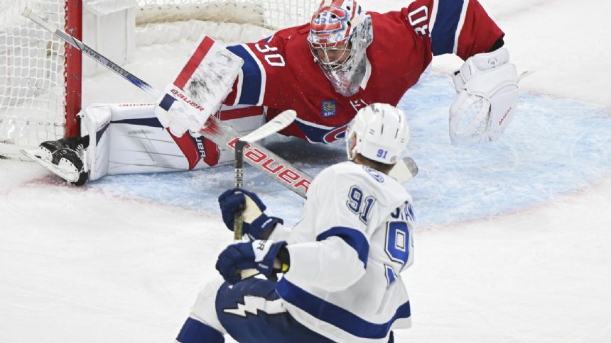 NHL points leader Nikita Kucherov has goal and 2 assists, Lightning beat Canadiens 7-4