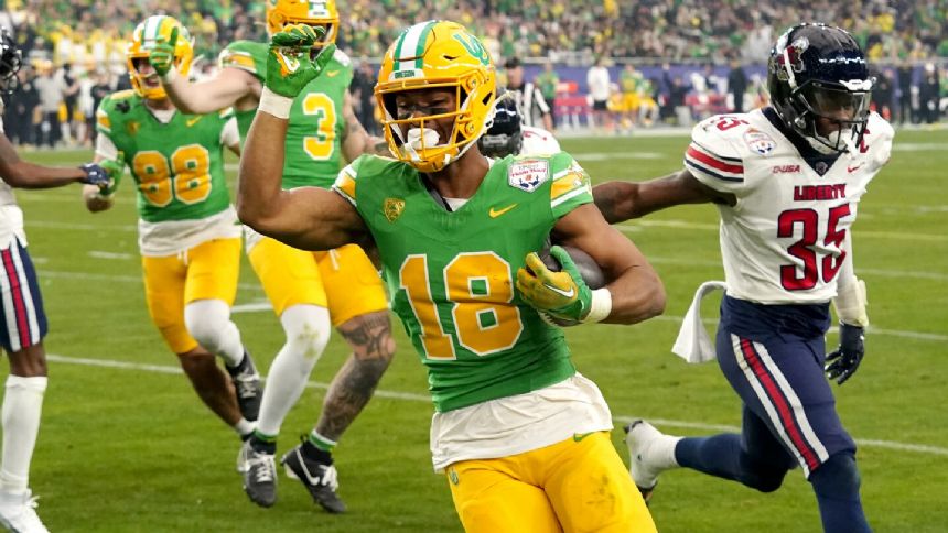 Nix closes career with 5 TD passes, No. 8 Oregon rolls over Liberty 45-6 in Fiesta Bowl