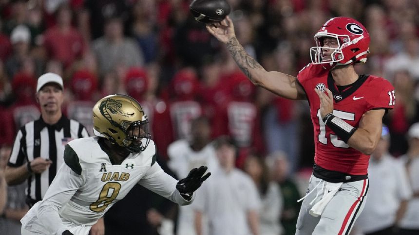 No. 1 Georgia faces first road game at border rival Auburn