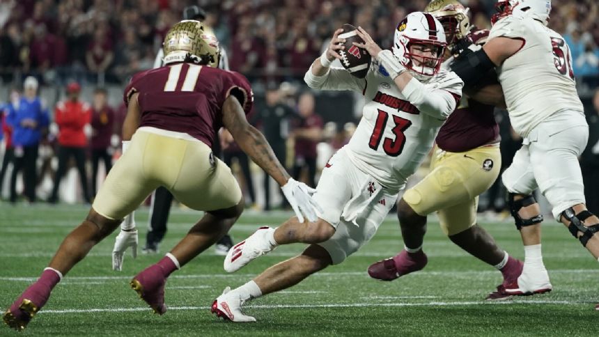 No. 16 Louisville looks for 11-win season facing Southern California in Holiday Bowl