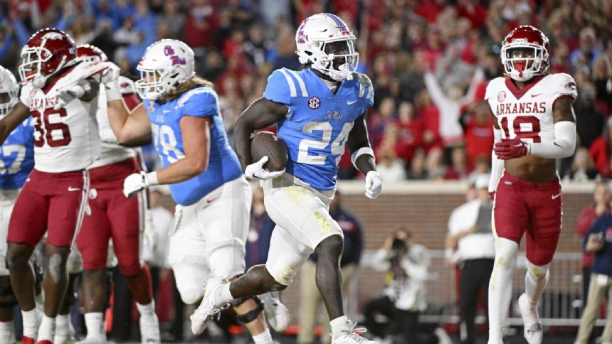 No. 16 Mississippi scores 10 points in fourth quarter to rally for 27-20 win over Arkansas