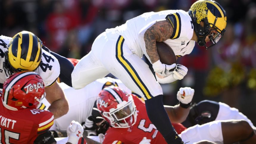 No. 2 Michigan escapes with 31-24 win over Maryland for 1,000th victory in program history