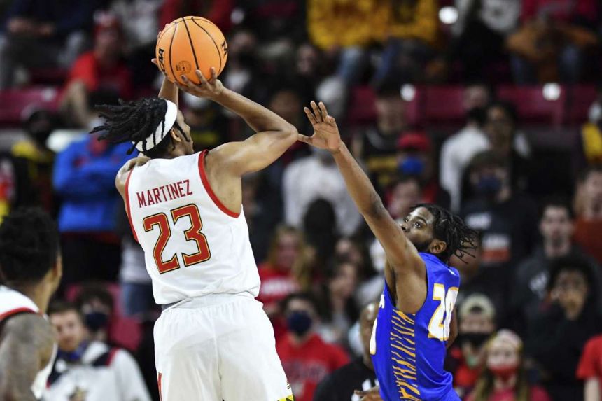 No. 20 Maryland edges Hofstra 69-67 on late free throws