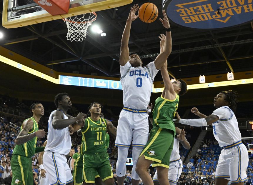 No. 21 UCLA rallies late, hangs on to beat Oregon 65-56