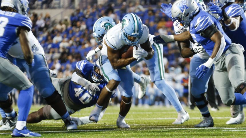 No. 23 Tulane rides 4-game winning streak into clash with North Texas