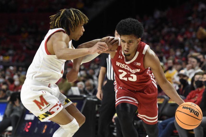 No. 23 Wisconsin edges Maryland after wasting 21-point lead