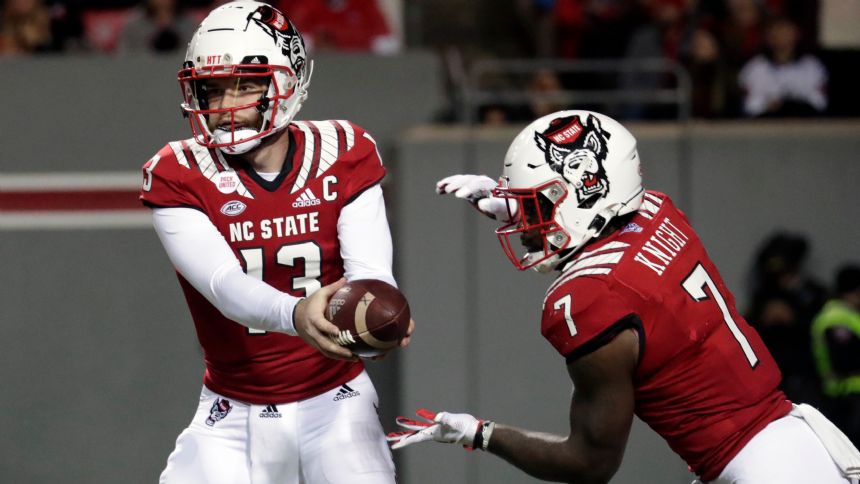No. 24 NC State stuns NC 34-30 with 2 TDs in 26 seconds