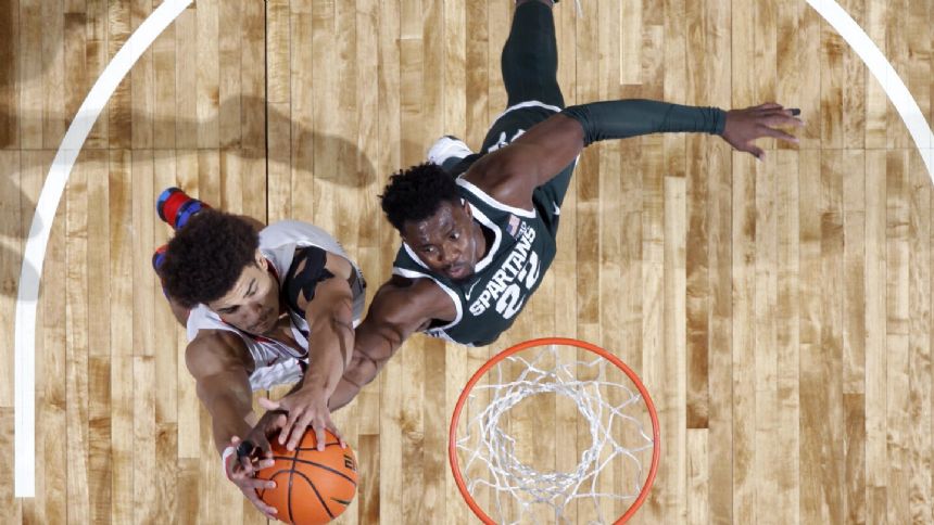 No. 4 Michigan State, stunned in its season opener, rebounds to beat Southern Indiana 74-51