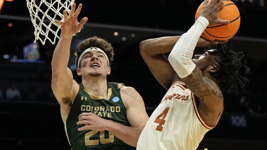 No. 7 Texas holds Colorado State to 11 points in first half, wins 56-44 to advance to Round 2