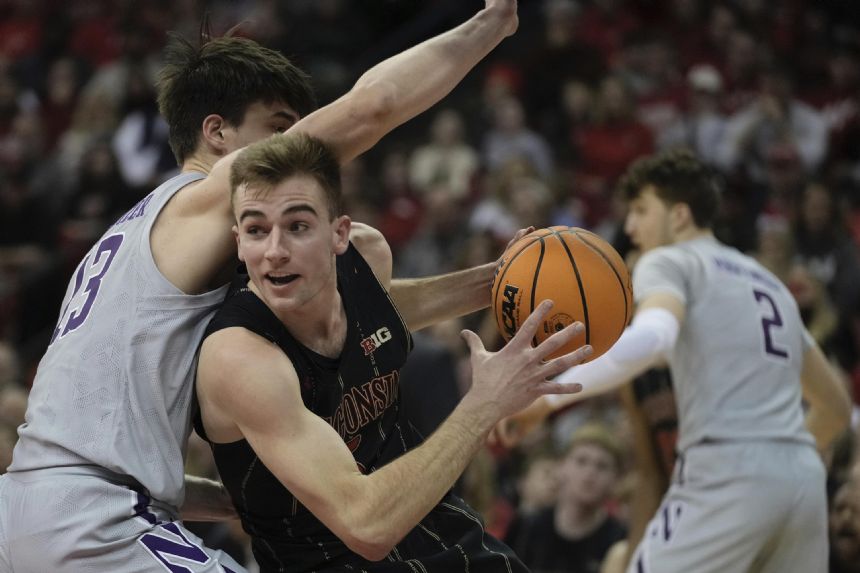 Northwestern sweeps Wisconsin for first time since '95-96