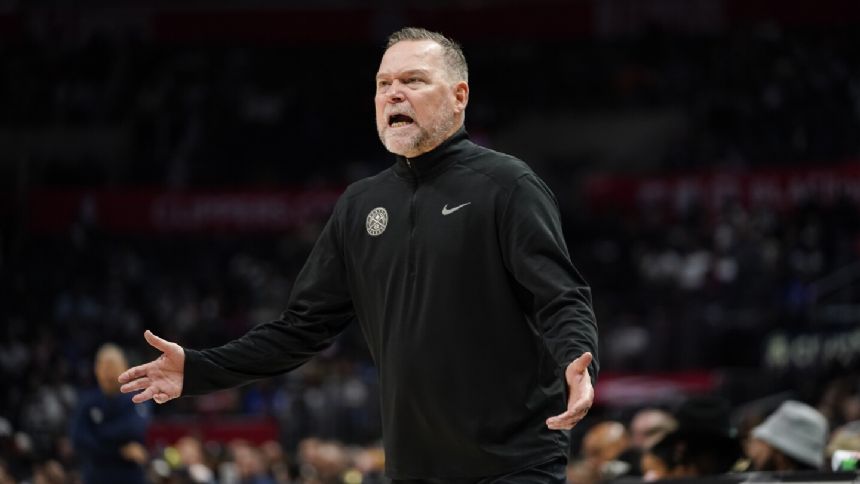 Nuggets coach Michael Malone remembers father on the eve of raising the championship banner