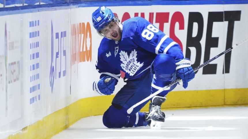 Nylander and Woll help Maple Leafs beat Bruins 2-1 to force Game 7