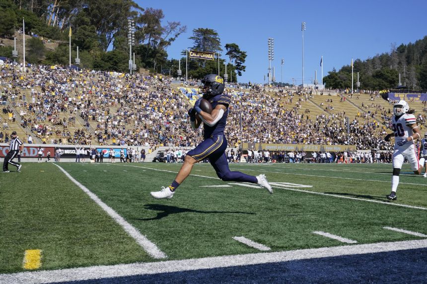 Ott rushes for 274 yards to lead Cal past Arizona 49-31