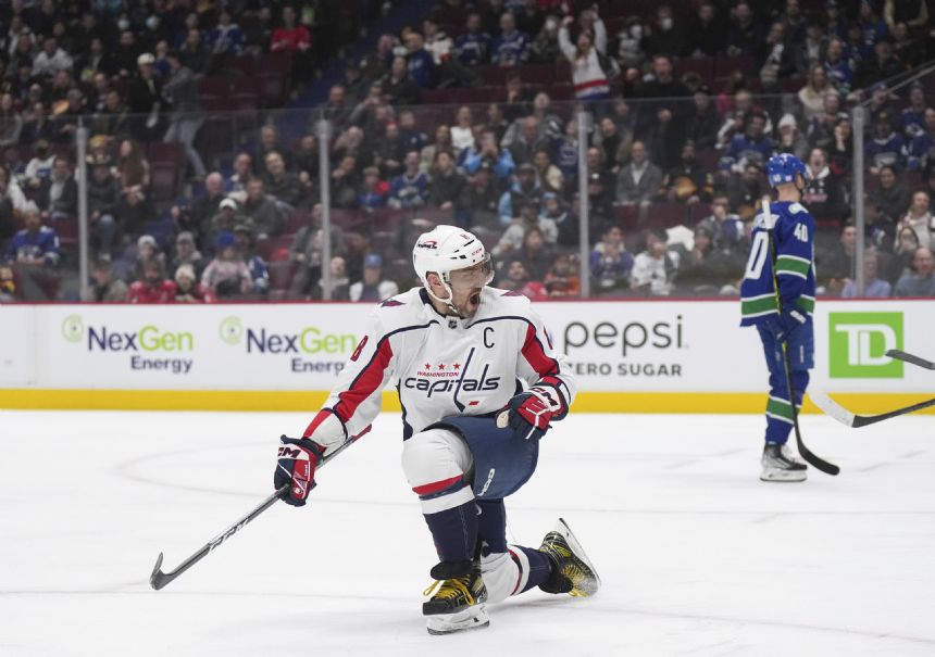 Ovechkin tops Gretzky for most road goals, Caps beat Canucks