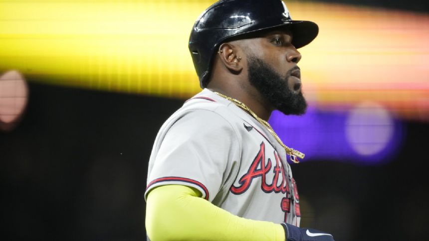 Ozuna's 30th home run leads Braves over Rockies 3-1 for 16th win in 21 games