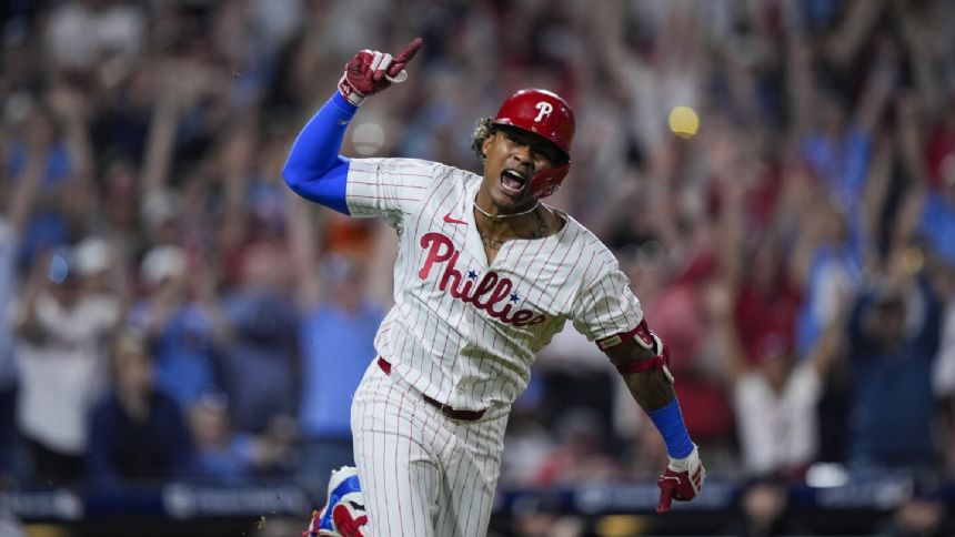 Pache's single, Harper's catch in 10th inning lift Phillies past Rockies