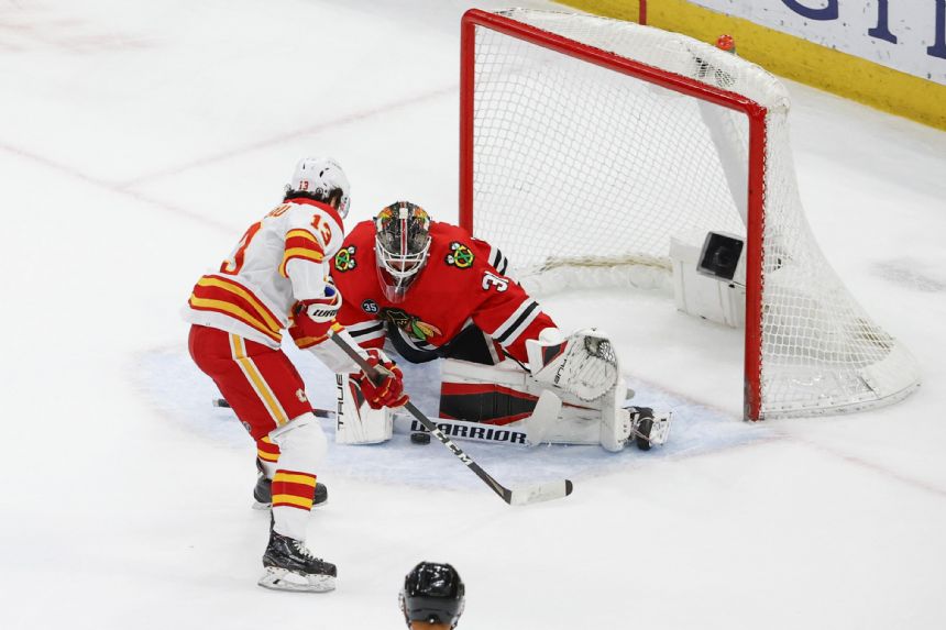 Pacific-leading Flames race to early lead, beat Chicago 5-2