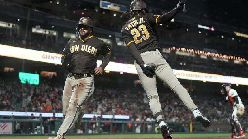 Padres keep playoff hopes alive, beat Giants 5-2 in 10th for first extra-inning win
