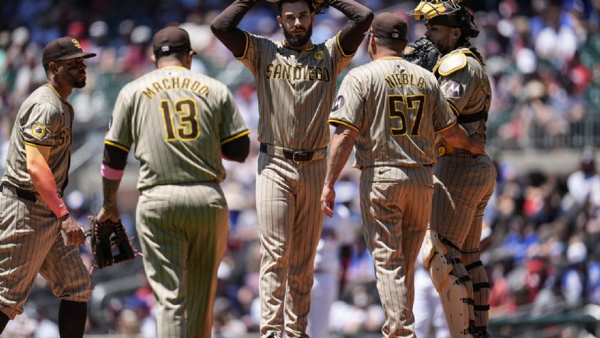 Padres second baseman Xander Bogaerts leaves game against Braves with apparent shoulder injury
