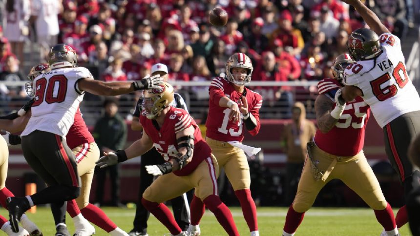 Perfect Brock Purdy throws 3 TD passes to lead the 49ers past the Bucs 27-14