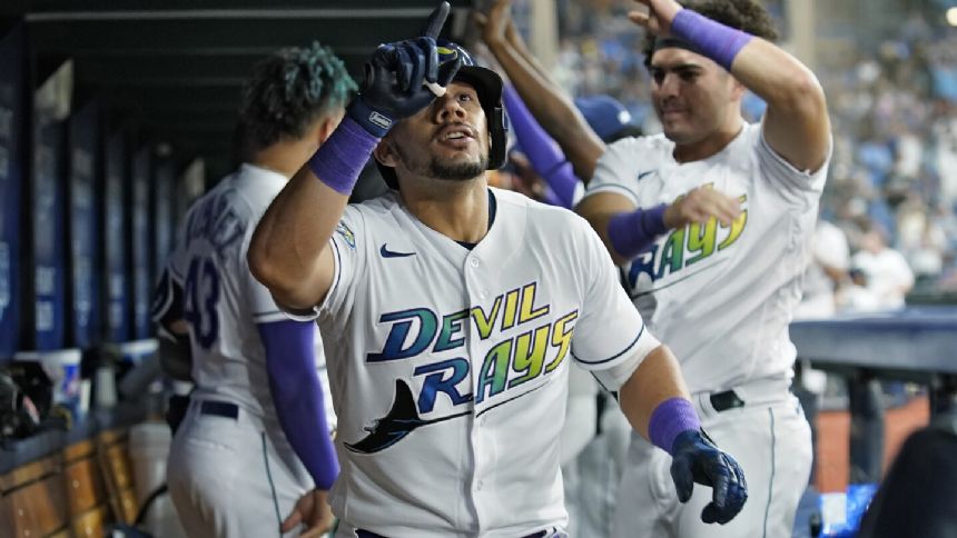 Pinto and Ramirez hit two-run homers in the 7th as the Rays rally to beat the Mariners 7-4