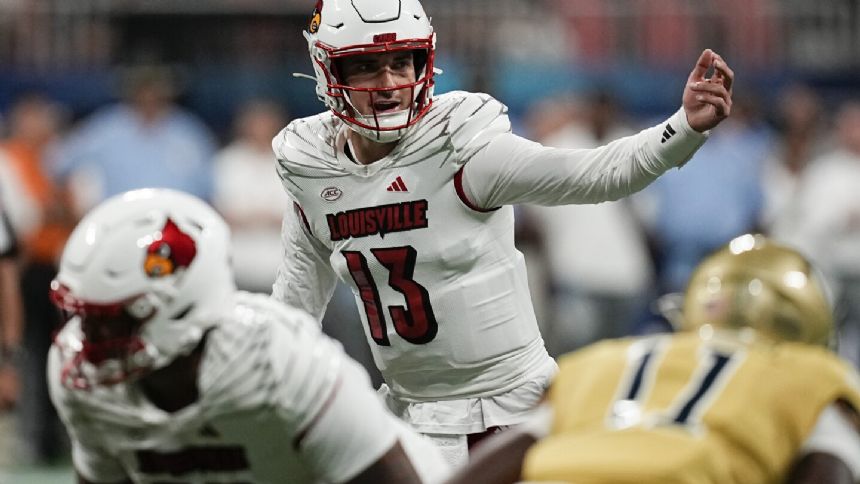 Plummer rallies Louisville over Georgia Tech 39-34 in opener