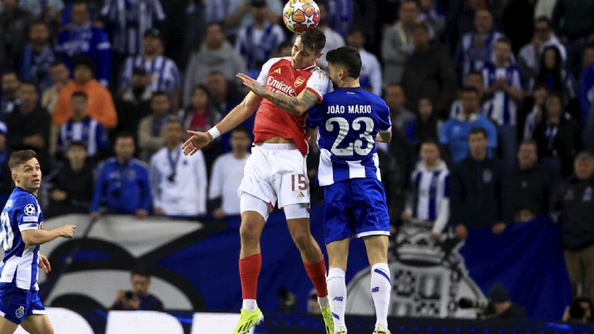 Porto beats Arsenal 1-0 with stoppage-time goal by Galeno in Champions League round of 16