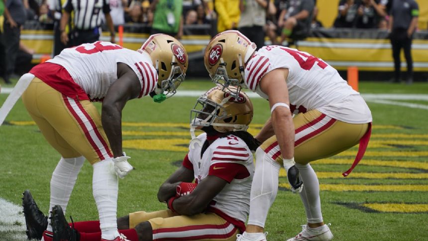 Purdy throws 2 TDs in return from elbow surgery; 49ers drill Steelers 30-7 in season opener