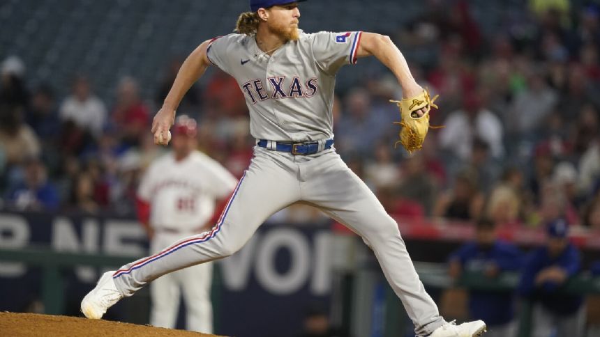 Rangers back Gray with 3 straight homers, beat Angels 5-1 to maintain AL West lead