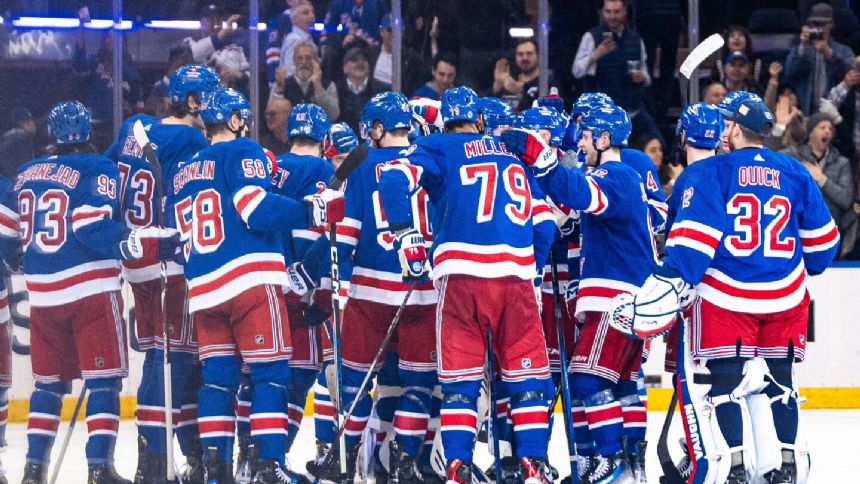 Rangers become 1st NHL team to clinch playoff berth, beat Flyers 6-5 on Fox's quick goal in OT