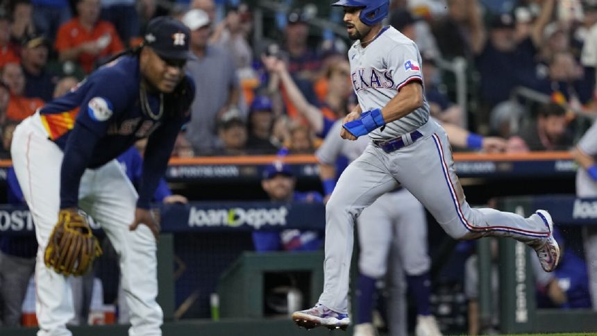 Rangers build big early lead off Valdez, hold on for 5-4 win over Astros to take 2-0 lead in ALCS