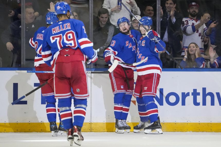 Rangers score 3 in third period to rally past Blues 6-4