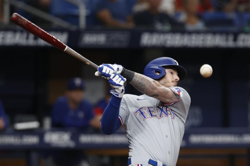 Rangers score 4 early, including Lowe HR, hold off Rays 4-3